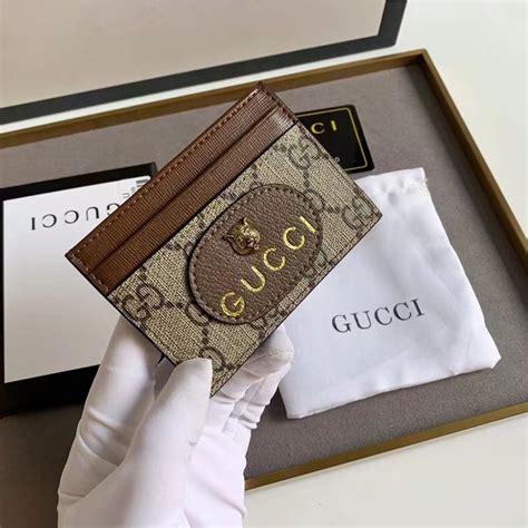 tarjetero hombre gucci|farfetch gucci.